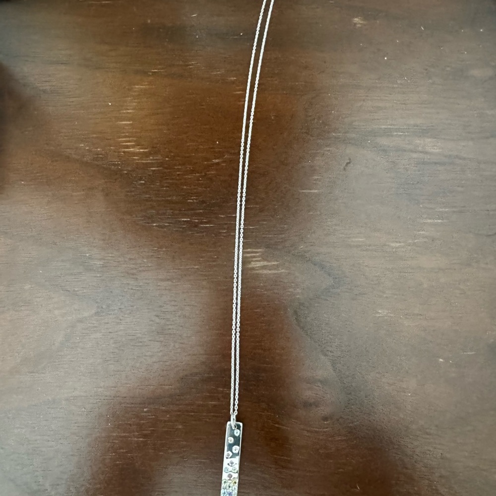 Elegant Silver Necklace with Floral Accents